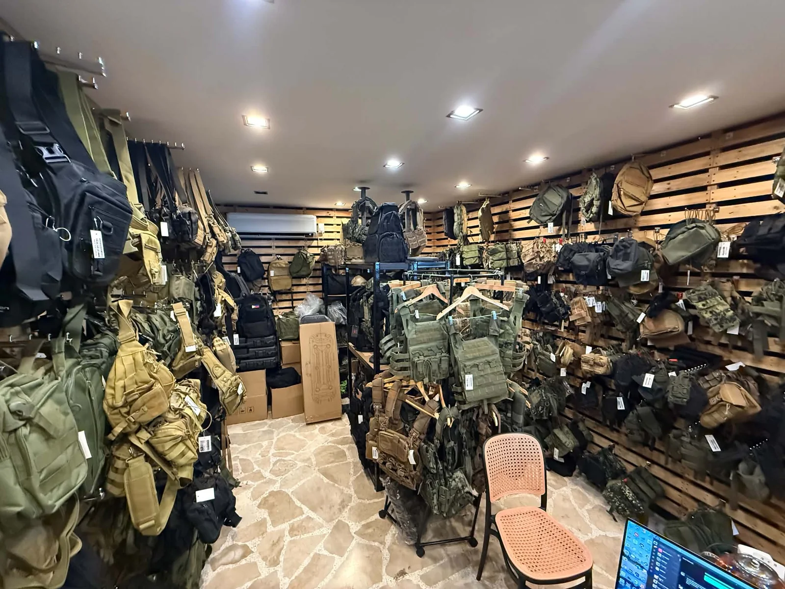 Wide view of Tactical Joe store inventory and tactical bags