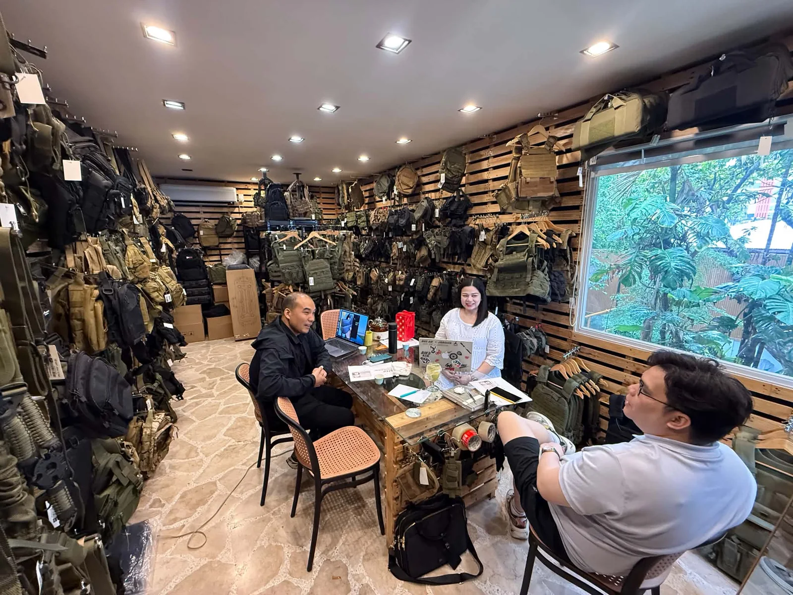 Tactical Joe team assisting customers inside the store